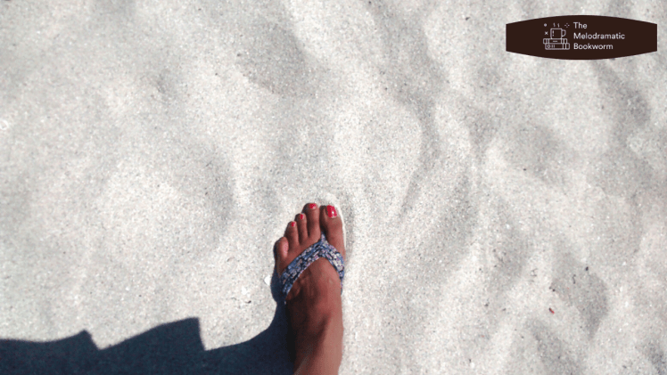 Feet on sand at Miami Beach